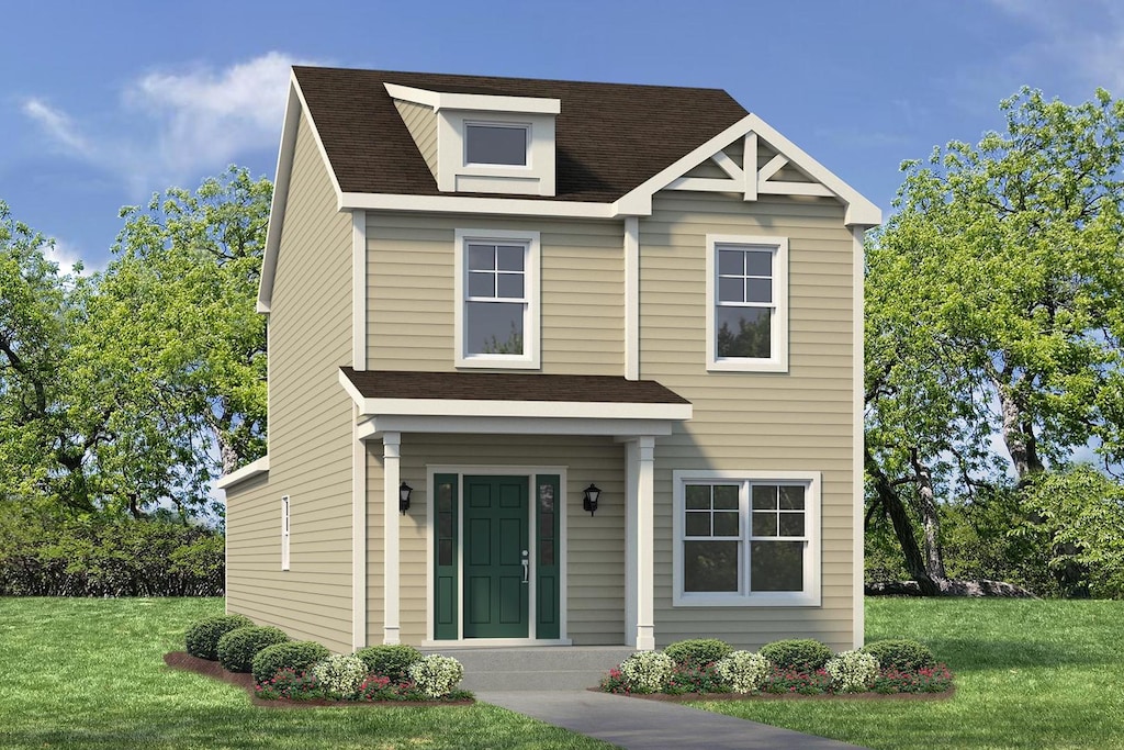 view of front of property featuring a shingled roof and a front lawn