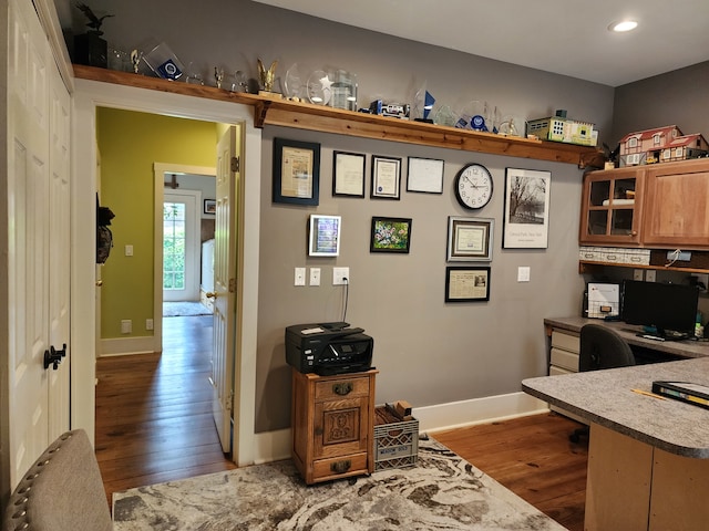 office space featuring dark wood-type flooring