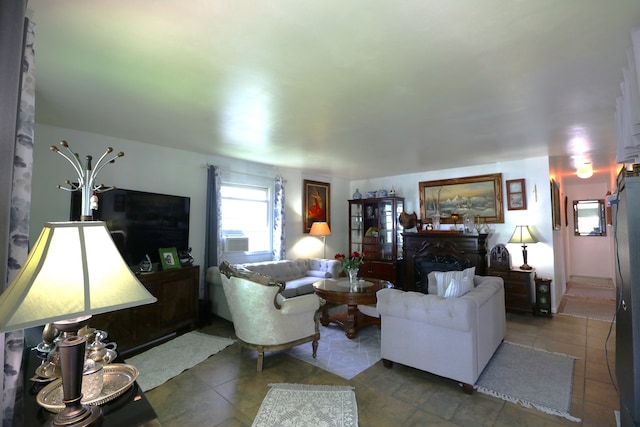 living room with tile patterned floors