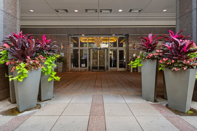 view of exterior entry featuring french doors