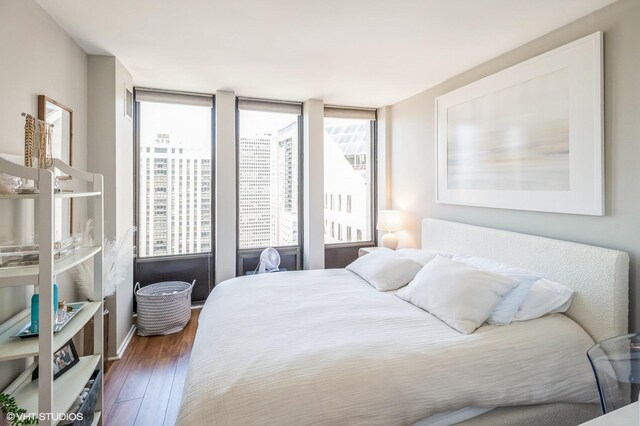 bedroom featuring hardwood / wood-style floors