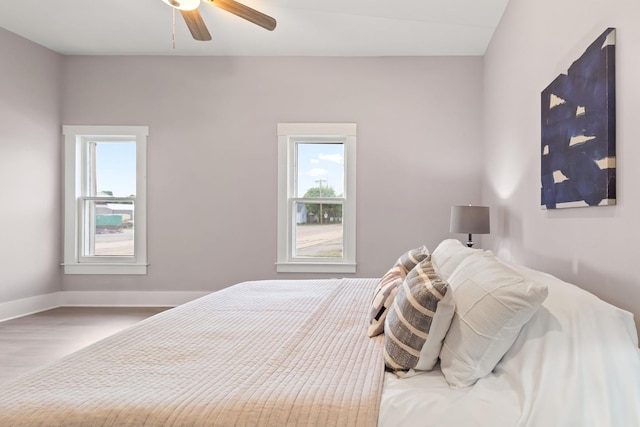 bedroom featuring ceiling fan and wood-type flooring