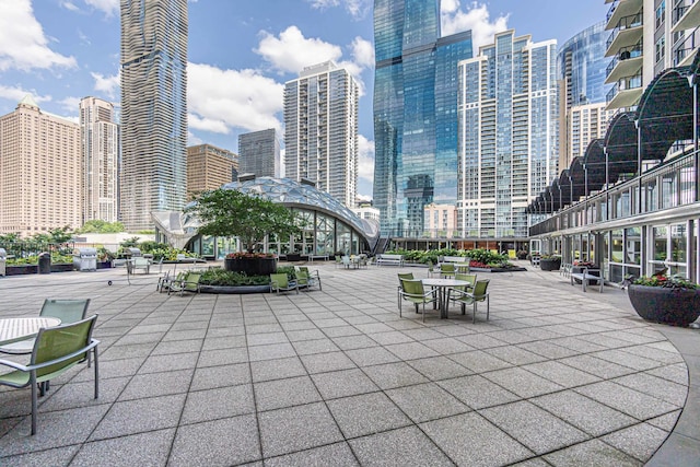 view of property's community with a patio