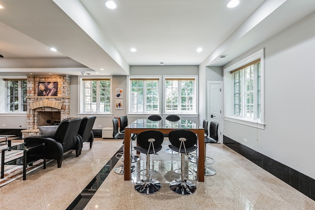 dining area featuring a fireplace