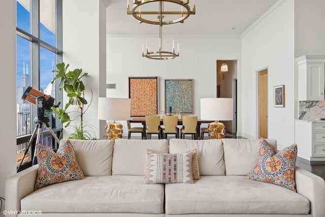 living room featuring a towering ceiling, a wall of windows, dark hardwood / wood-style flooring, and a notable chandelier