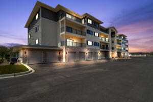 outdoor building at dusk with a garage