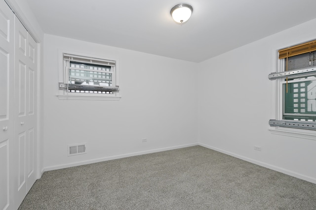 spare room with carpet flooring