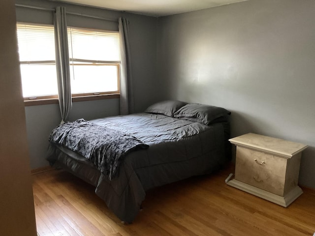 bedroom featuring light hardwood / wood-style floors