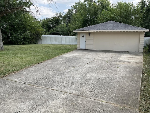 garage with a lawn