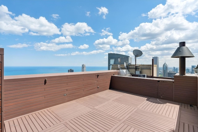 deck featuring a water view