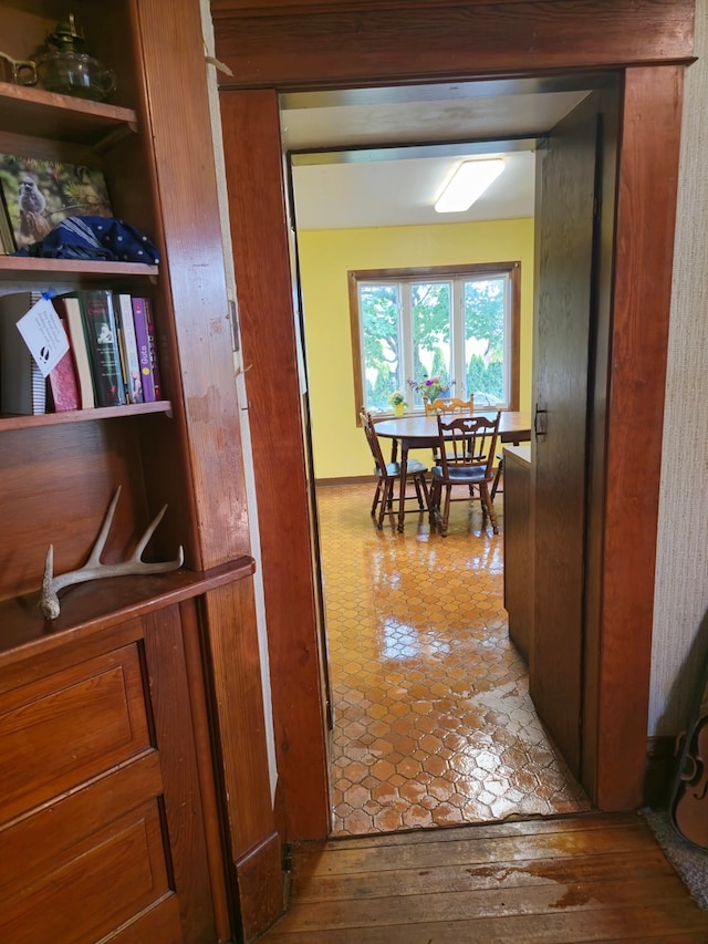 hall featuring wood-type flooring