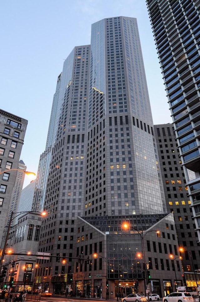 view of outdoor building at dusk