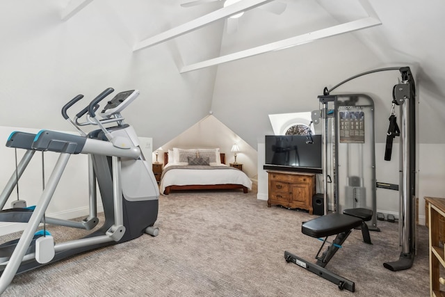 workout room with carpet floors and vaulted ceiling