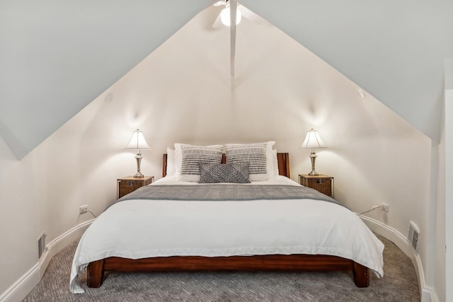 bedroom featuring lofted ceiling, carpet floors, and ceiling fan