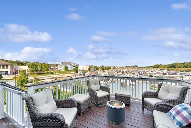 wooden terrace with a water view