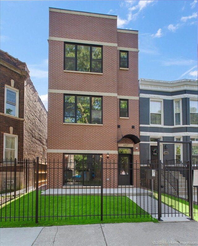 view of front of house with a front lawn