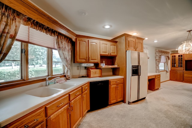 kitchen featuring black dishwasher, sink, pendant lighting, light colored carpet, and white fridge with ice dispenser