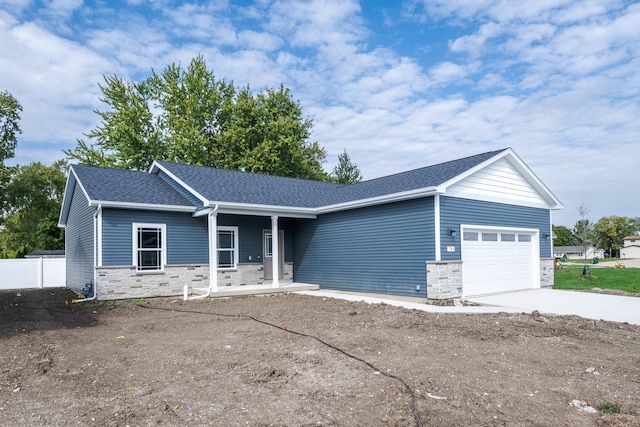 single story home with a garage