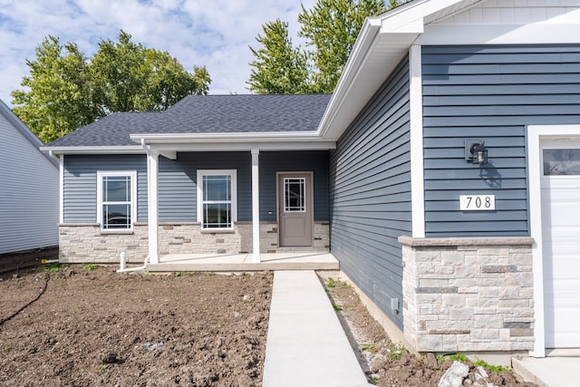 property entrance featuring a garage