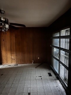 unfurnished room with ceiling fan