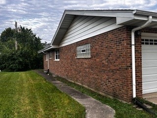 view of property exterior featuring a yard