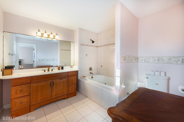 full bathroom with vanity, tile patterned flooring, toilet, and tiled shower / bath combo