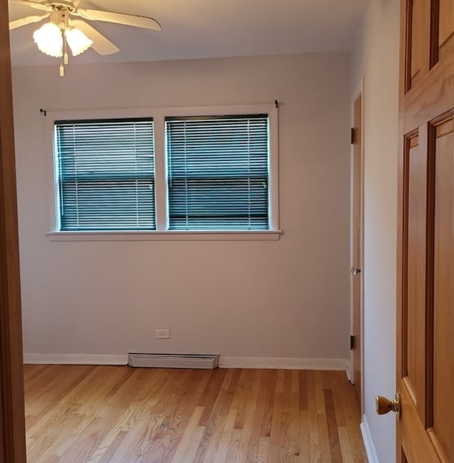 unfurnished room with light hardwood / wood-style flooring