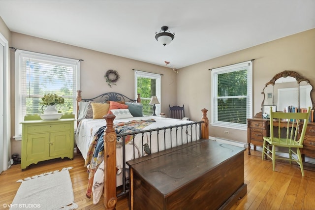 bedroom with light wood-type flooring