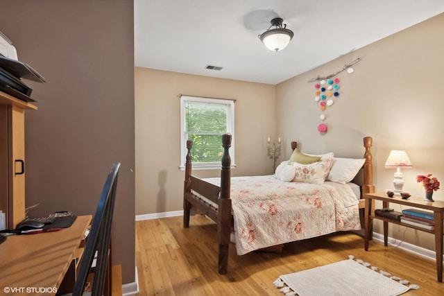 bedroom featuring light wood-type flooring