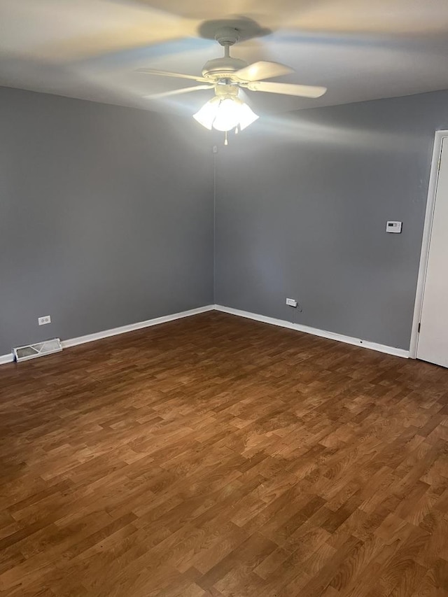 1269 Arthur St, Calumet City, IL 60409 - unfurnished room with ceiling fan, dark wood finished floors, and baseboards