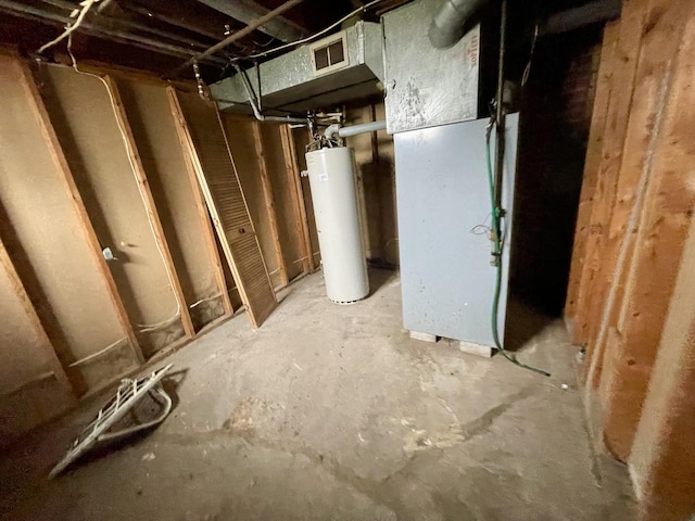 basement featuring water heater