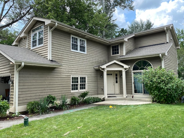 view of front property with a front yard