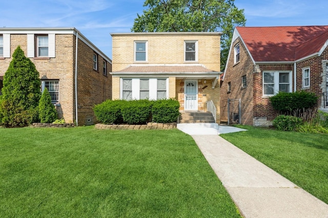 view of front facade with a front yard