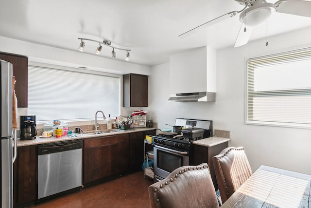 kitchen with sink, dark brown cabinetry, ceiling fan, and appliances with stainless steel finishes