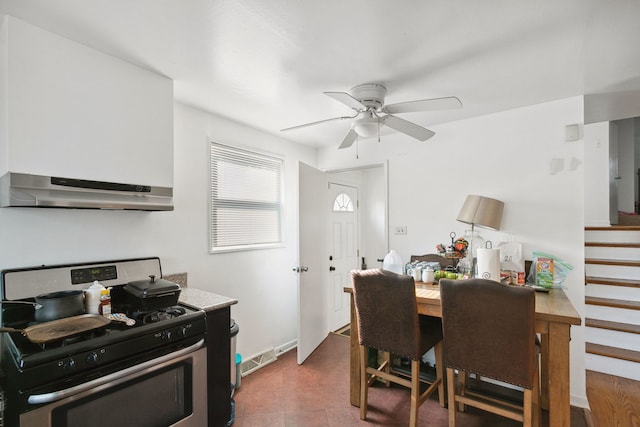 kitchen with stainless steel range with gas stovetop and ceiling fan