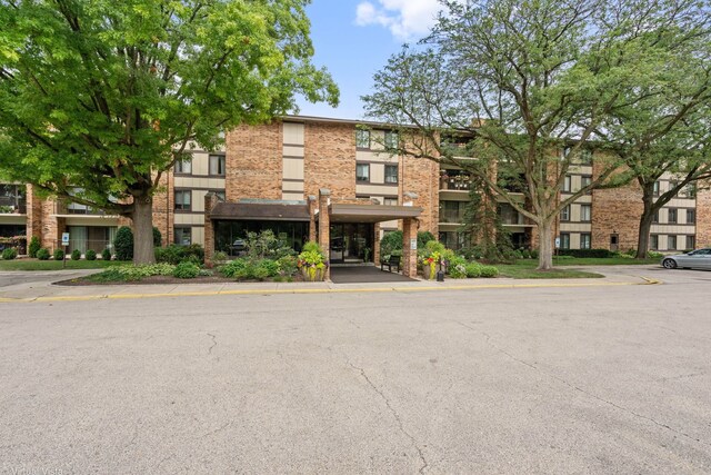 view of property featuring a carport