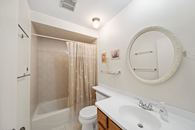 full bathroom featuring tile patterned flooring, vanity, toilet, and shower / bath combo with shower curtain