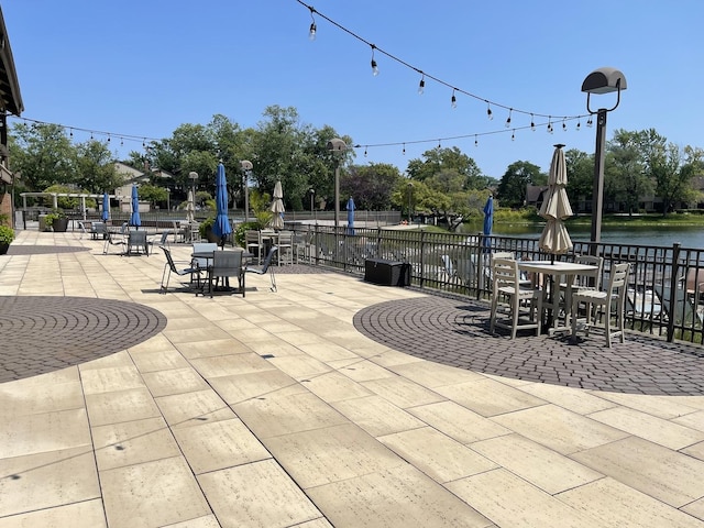 view of patio featuring a water view