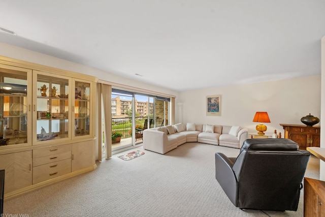 living room with light carpet