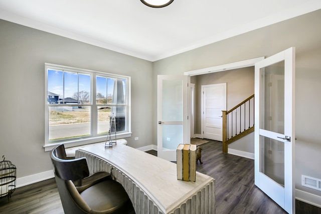 office space featuring crown molding and dark hardwood / wood-style floors