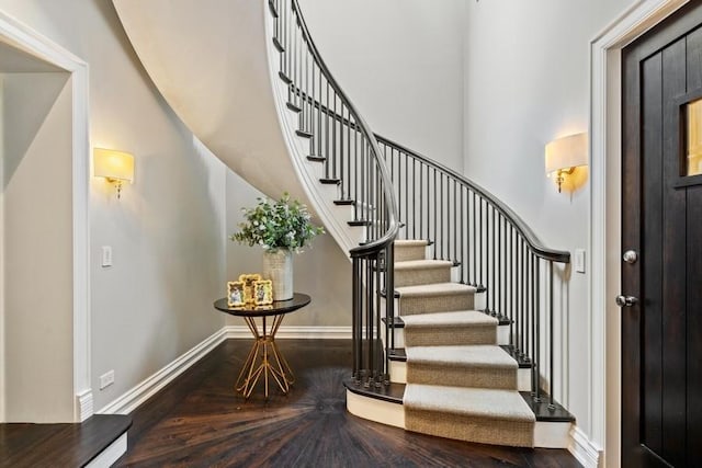 1407 N Hoyne Ave, Chicago, IL 60622 - staircase featuring wood finished floors and a high ceiling