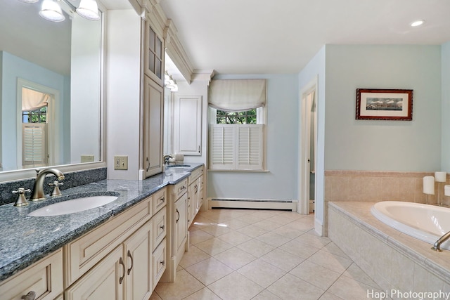 bathroom with a relaxing tiled tub, a baseboard radiator, tile patterned flooring, and dual vanity