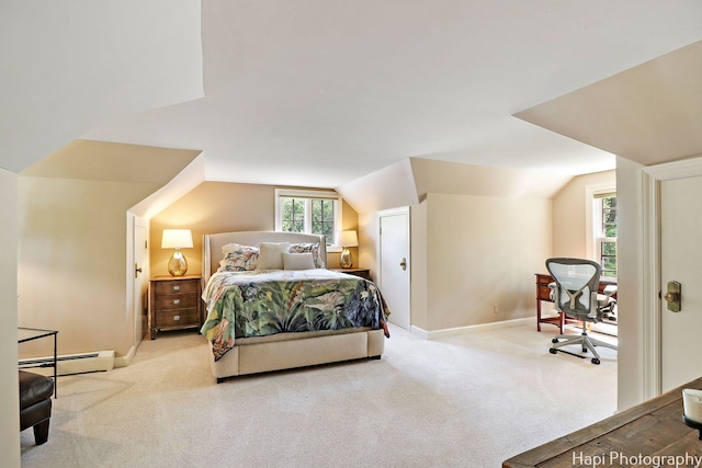 bedroom featuring lofted ceiling, light colored carpet, and a baseboard radiator