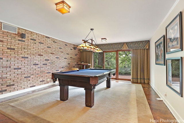 playroom featuring tile patterned floors, ornamental molding, pool table, and brick wall