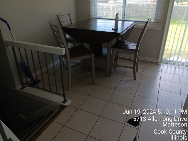 dining room with light tile patterned floors