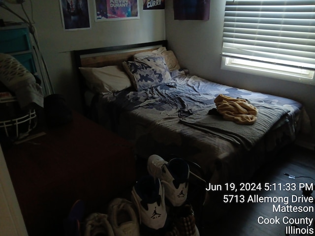 bedroom featuring hardwood / wood-style flooring