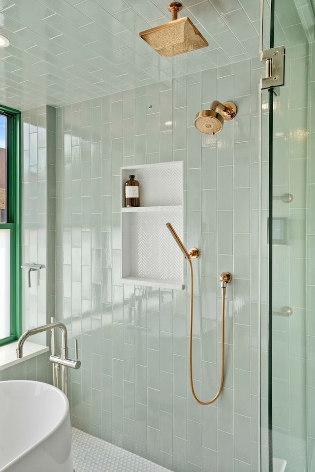 bathroom featuring sink and independent shower and bath