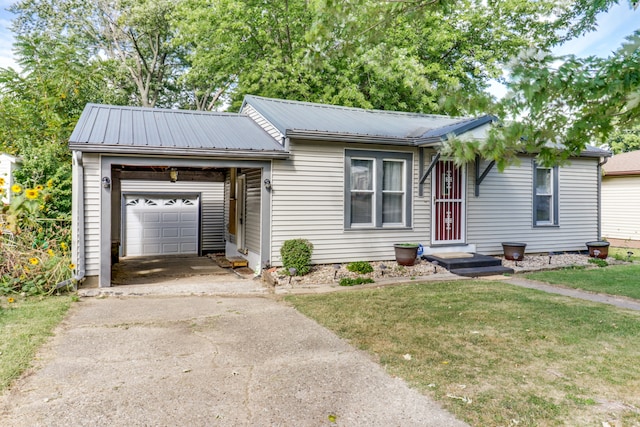 ranch-style home with a front yard and a garage