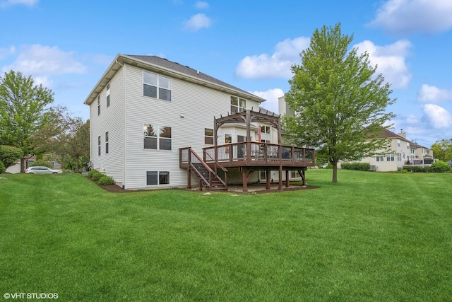 rear view of house with a yard, a deck, stairs, and a pergola