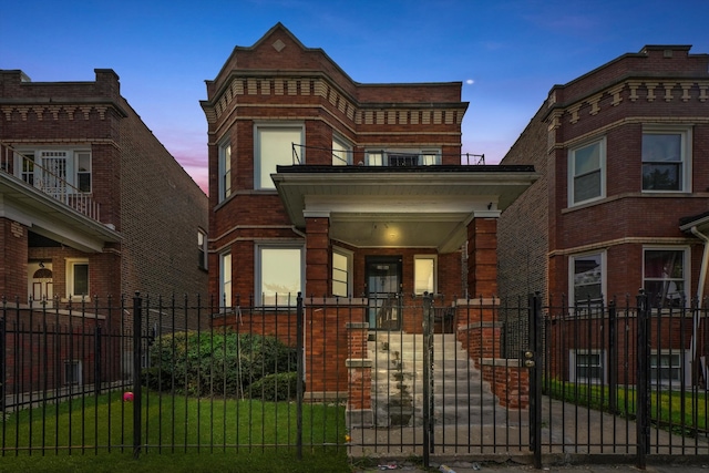 view of front of house featuring a balcony